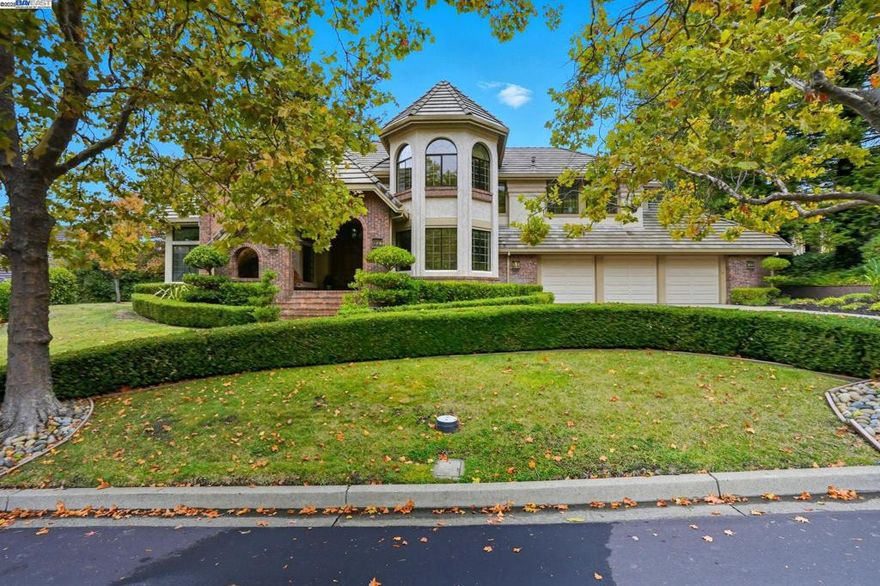 Set behind the gates of the highly coveted Blackhawk Country Club, this exceptional residence offers the perfect combination of elegance, comfort, and resort-style living. Overlooking the scenic 3rd hole of the Lakeside Blackhawk golf course, this 4-bedroom plus office home captures sweeping fairway and hillside views from nearly every room. Inside, a fantastic open floor plan welcomes you with expansive living spaces filled with natural light. The chef’s kitchen flows seamlessly into the family and dining areas, creating an inviting space for entertaining. A 200-bottle temperature-controlled wine cellar highlights the home’s sophistication and attention to detail. Upstairs, the luxurious primary suite provides a serene escape complete with a spa-inspired bath and balconies showcasing breathtaking golf course views—a perfect spot for morning coffee or sunset relaxation. The resort-style backyard is a true showpiece, featuring a gorgeous pool and spa, outdoor kitchen, and fireplace—ideal for entertaining year-round. Whether hosting a summer gathering or enjoying tranquil evenings by the fire, this home offers the quintessential Blackhawk lifestyle.