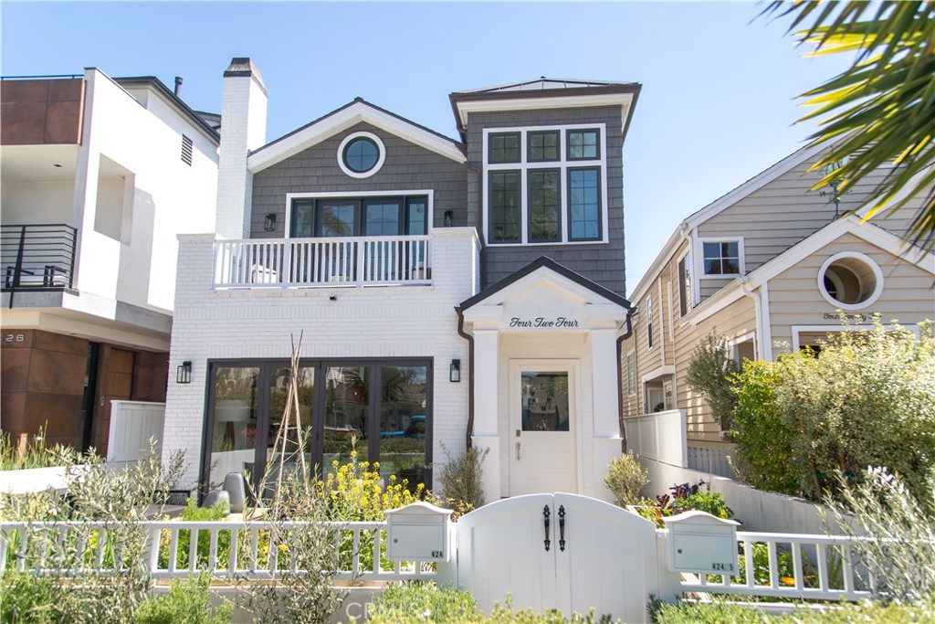 This three-bedroom front home, expertly crafted by the renowned Brandon Architects, is a masterpiece of timeless design and modern elegance. The property opens with a landscaped front courtyard, offering a warm and inviting first impression. Bifold doors along the façade create a seamless connection between the interior and the outdoors, perfectly capturing the relaxed Corona del Mar lifestyle.
The interiors feature soaring ceilings, natural hues, and wide-plank flooring that together create a serene and sophisticated atmosphere. At the heart of the home is a chef’s kitchen outfitted with premium commercial-grade appliances, including a 6-burner range with griddle, dual ovens, and an industrial sink. The oversized marble island, surrounded by ample cabinetry and expansive counter space, serves as a focal point for both culinary endeavors and casual gatherings. The open-concept design flows effortlessly into the formal dining area and a cozy living room centered around a fireplace with a driftwood mantel.
The primary suite is a private haven, highlighted by a spacious balcony, vaulted ceilings, and a custom walk-in closet. The adjoining spa-inspired bathroom is complete with a soaking tub, a walk-in shower, dual sinks, and a separate water closet. Additional features include a secondary ensuite bedroom, a main-floor bedroom with plentiful storage, and a well-equipped laundry room. The finished garage comes pre-wired for electric vehicle charging.
Crowning this exceptional property is an expansive rooftop deck that offers ultimate privacy and captivating city views, ideal for entertaining or unwinding. Located in the heart of Corona del Mar Village, this rare home places you just moments away from world-renowned beaches, iconic harbor destinations, and premier dining and shopping. It’s coastal living redefined. Listed rate is for 12 month lease.