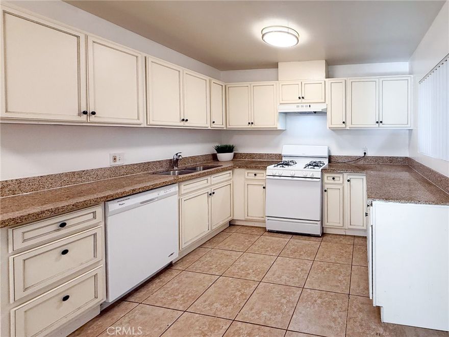 IMMACULATE 2 BEDROOM 1 BATH LOWER LEVEL END UNIT COMPLETELY REMODELED!  Bright unit corner in move-in condition.  Close to "Atwater Village", "Eagle Rock", and "Echo Park".  Upgrades include the following:  Complete new copper plumbiong, dual pane windows, updated and bright  granite kitchen with newer cabinets & appliances, ceramic tile flooring in living room, kitchen and bathroom, beautiful wood laminate floors in bedrooms, fresh interior painting, remodeled bathroom with newer vanity and fixtures, vertical blinds, light fixtures, newer closet doors, baseboards, wall heater, window air conditioner, separate laundry room with newer coin operated washer and dryer, 1 designated covered carport.  This is a lower end unit  located in a 2-story 15 unit building with mature landscaping. One of the nicest and cleanest units available.  Don't miss out on this beautiful unit!