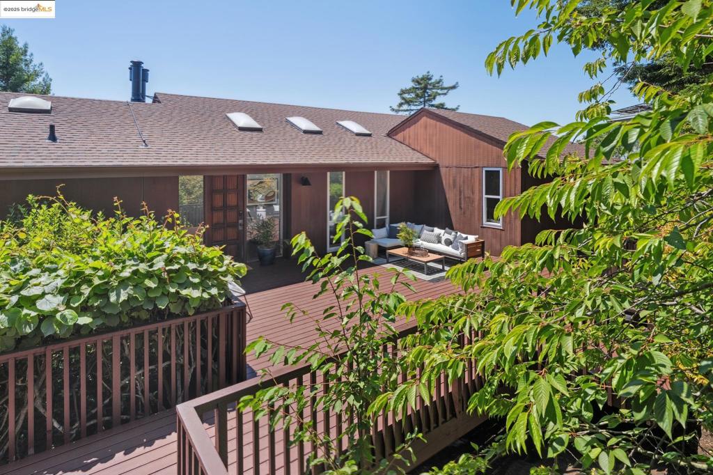 Mid-century with luscious lifestyle; views from all bdrms, living rooms, dining room, & kitchen.Generously sized great rooms, decks to view, and a pristine pool to vacation at home. Rarely does a home of this style and size come to market. This California home has had only 1 owner. Are you ready to be the next? Tucked on a special street, this home embraces stunning views of the western skyline, SF, Golden Gate Bridge, and the brilliant Bay Area. The rooms are appoint the beauty of life, sit and view the Bay or enjoy the many outdoor spaces. Enjoy a dip in the starlit pool, also with views, and for your convenience, there’s a changing room with a shower. Discover inspiration on overlooking the vast garden, and find magic in your exchanges with nature. With 4+ bedrooms, an office, and 3.5 bathrooms, this home offers 3 levels with 4000+ sq ft* of artistry and opulence. The kitchen: it’s hard to do the dishes when you can’t stop viewing the Golden Gate Bridge. 2 refrigerators, large pantry, & eat-in kitchen. This house feels expansive, capturing places to retreat, work, socialize, or just relax. 2 car garage. Located in the North Berkeley Hills, embraced by Tilden Park trails, Solano Avenue, N. Berkeley and College Avenue shops & restaurants are just minutes away.