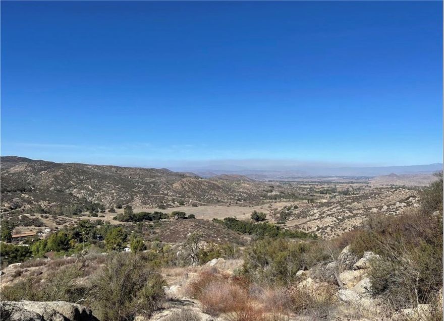 Exceptional 40-Acre parcel with Panoramic Views!!  Discover the perfect blend of natural beauty and development potential with this expansive 40-acre property located in the scenic hills of Hemet.   This property offers breathtaking panoramic views of surrounding mountains, valleys and lakes and the beauty of rural living while being just a short drive to Temecula Wineries, shopping, dining, lakes and recreational activities.There is an existing well, electricity nearby and corners marked.  Access is easy and at the end of Martin Road. Whether you're dreaming of a private estate, growing a vineyard, or a creating weekend getaway retreat, this property offers you endless possibilities.