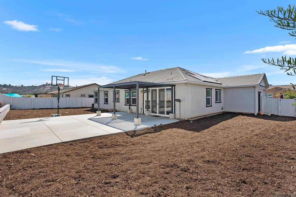 Seller is offering a 2/1 buy down, on this exquisite 3BR, 2.5BA ranch style home has 2,061 sqft. on a 10,083 sqft. lot. Features include owned solar, chef kitchen, Wolf oven, 2 Tesla wall back ups, 19 solar panels, vinyl flooring, carpet, 3-car garage with epoxy flooring, water softener, reverse osmosis, electric car hookups. Enjoy community amenities: sparkling pool, clubhouse, gym, fire pit, BBQ grill, outdoor cooking area, bike/hiking trails, basketball court, pickle ball court, playground, and picnic areas. A rare blend of elegance, comfort, and opportunity! ADU plans from San Diego County, Valley Center, and HOA offer endless potential, inquire for more details.