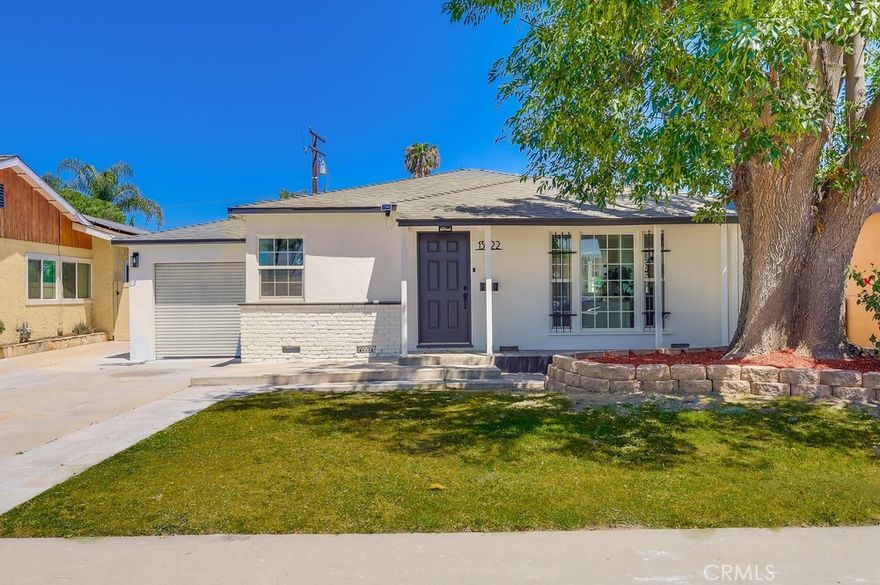 Welcome to Your Dream Home - Nestled in a quiet and highly desirable neighborhood, this fully remodeled home perfectly blends sleek modern design with timeless comfort. Featuring a bright and spacious floor plan, the home has been thoughtfully upgraded with luxurious finishes and stylish details throughout. Fresh paint and new laminate flooring with elegant baseboards throughout the entire property, creating a cohesive and contemporary feel. The cozy living room, complete with a fireplace and recessed lighting, offers a warm and inviting space ideal for both relaxation and entertaining. The gourmet kitchen features a quartz countertop, a chic subway tile backsplash, a charming farmhouse sink, and custom cabinetry. Next to the kitchen, the expansive entertaining room features a second fireplace, recessed lighting, and laminate flooring, providing the perfect setting for gatherings or quiet evenings at home. Both bathrooms have been fully renovated, featuring modern vanities and walk-in showers designed for both style and function. Step outside to a large backyard with plenty of space for entertaining, gardening and recreation. The backyard also includes a renovated storage unit providing additional storage space. Conveniently located near major highways, shopping centers, and schools, this home offers the perfect balance of indoor luxury and outdoor relaxation. Don’t miss your opportunity to own this exceptional home—schedule a tour today!
