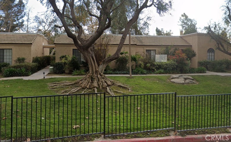 This unusual single story 2 bedroom and 2 full bathroom unit is a charmer. It has the unusual feature of having its own washer and dryer hook ups located in master closet, so the HOA laundry facility is not required, but it is still available. Air conditioner and water heater fairly recently replaced. Quiet community with tall trees. HOA has a community pool and jacuzzi. This unit has a one car garage as well. The unit has a birds eye view of the community below. The views and feel of the community are very desirable.