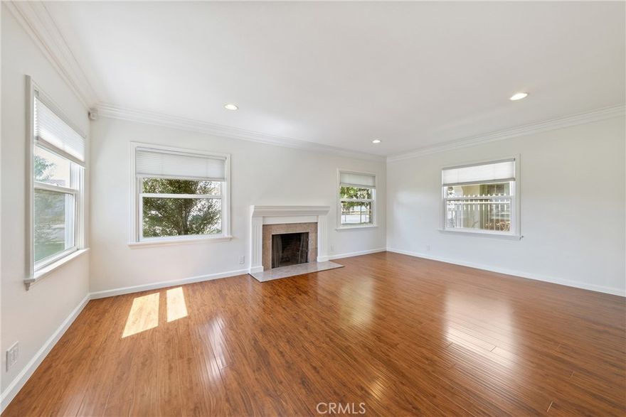 SINGLE-STORY CHARMING HOME WITH A PEACEFUL OUTDOOR HAVEN! Perched along a tree-lined street, step inside this quaint property and immediately notice the open and airy living spaces highlighted by a multitude of windows for exceptional natural light. Step right into the living area featuring a fireplace, perfect to cozy up to on the coming cold nights. The separate dining area opens up to the kitchen, perfect for entertaining guests. The kitchen is well equipped with granite countertops, stainless steel appliances and plenty of cabinets for storage. Freshly painted interior throughout for the lucky next tenants! Wood flooring throughout. 3 sizeable bedrooms with the primary suite directly opening up to the spacious backyard. Enjoy the serene oasis without the hassle of maintenance as gardening is included. Washer and dryer conveniently located in a separate room inside the property. 2-car detached garage with a long driveway and ample street parking. Conveniently located by many shops, markets, restaurants, schools and easy access to the 57 or 5 freeways. Short drive to Downtown Orange with great restaurants and bars.