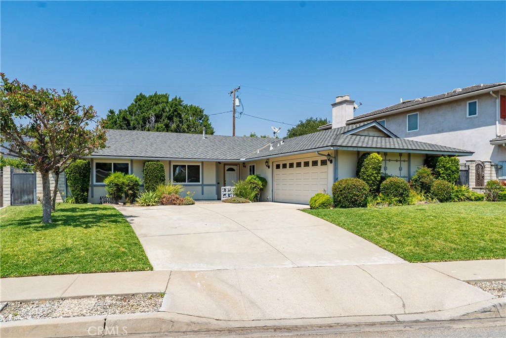 Nestled in a Glendora cul-de-sac, this inviting single-story home combines comfort, style, and convenience in one desirable package. Offering 4 bedrooms and 2 bathrooms, it’s designed for both everyday living and effortless entertaining. Step inside to a spacious living room where a cozy fireplace and sliding glass doors create a seamless connection to the backyard. The kitchen, with its abundant cabinetry, opens to a dining area featuring its own sliding door to the side yard perfect for casual meals or weekend gatherings. The primary bedroom offers a backyard access and a ¾ bath, while the additional bedrooms share a full hall bathroom. Recent updates include fresh interior paint, new carpet, new vinyl flooring, dual-pane windows, and recessed lighting, making the home move-in ready. Enjoy the outdoors in a backyard that boasts a grass play area, covered patio, and an above-ground spa for relaxing evenings under the stars. The 2-car attached garage with direct home access adds everyday ease. Located near top-rated schools, parks, shopping, and dining, this home offers a lifestyle as convenient as it is comfortable. Don’t miss your chance to make this Glendora gem yours!