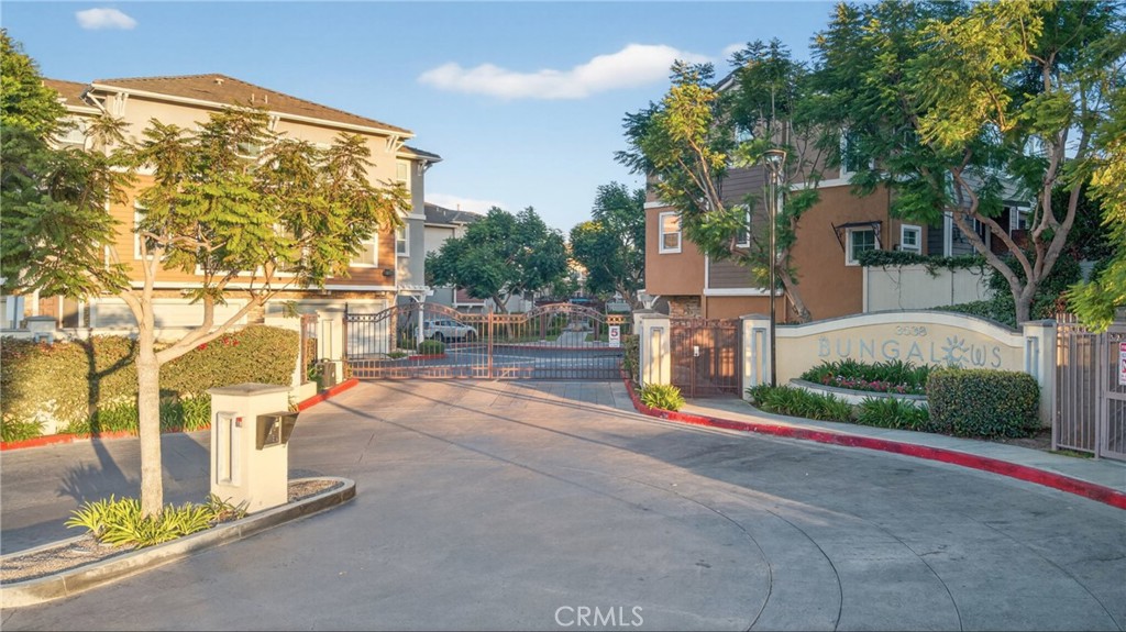 Best locations in community and best location in town. Open front door and jump into community pool. Large private yard exclusively for your enjoyment. Bright and breezy 3-bedroom, 2.5-bathroom townhome in the highly sought-after Beach City of Bungalows. This home features luxury vinyl wood flooring and plantation shutters throughout. The modern kitchen boasts granite countertops, an elegant island, a spacious pantry and stainless-steel appliances for your everyday living and entertaining. Seamlessly connecting to the formal dining area. The spacious living room features a dual-sided fireplace and opens to a private balcony which overlook private yard and community pool. Upstairs, the master suite includes two closets (one walk-in) and a master bath with soaking tub. HOA amenities, including a community sparkling pool and spa. Additional features include central AC, an attached 3-car garage, and ample space for laundry and storage. Located in the award-winning Torrance Unified School District (West High, Jefferson Middle and Anza Elementary). Near Del Amo Shopping Center, 10 minutes to California beaches, restaurants, supermarkets, movie theaters, parks, YMCA, Civic center, library and easy 405 & 110 freeway access. Turnkey!