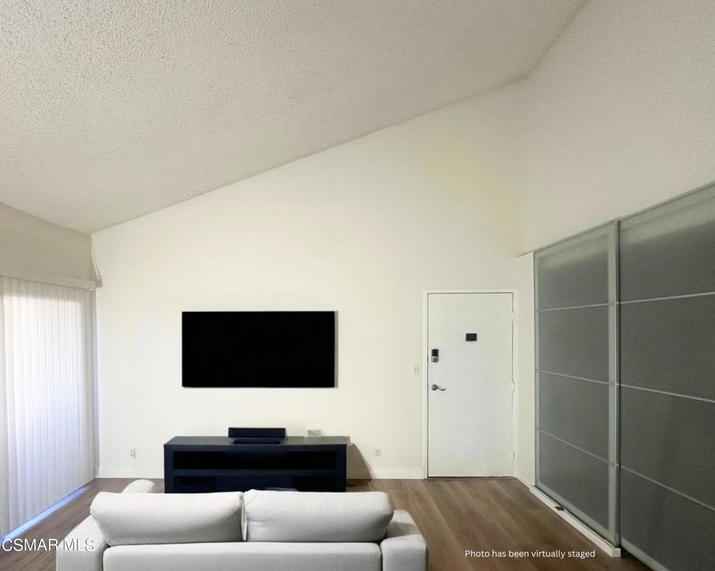 This delightful 1 Bed 1 Bath condo boasts a light and bright ambiance. Upon entering the unit, you'll be greeted by soaring vaulted ceilings, wood-like flooring and an abundance of natural light. The living room features high ceilings and access to your private balcony. This property offers a swimming pool and spa, along with two conveniently located covered parking spaces. You'll enjoy being in close proximity to hiking and biking trails, freeway access, shopping, and Starbucks. Water and gas included in rent!!!