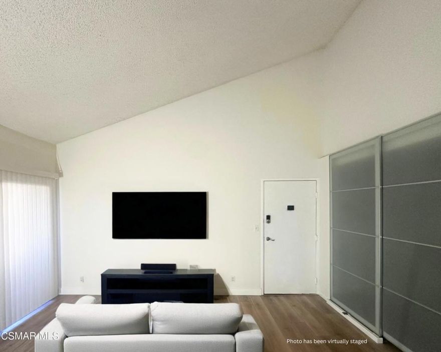 This delightful 1 Bed 1 Bath condo boasts a light and bright ambiance. Upon entering the unit, you'll be greeted by soaring vaulted ceilings, wood-like flooring and an abundance of natural light. The living room features high ceilings and access to your private balcony. This property offers a swimming pool and spa, along with two conveniently located covered parking spaces. You'll enjoy being in close proximity to hiking and biking trails, freeway access, shopping, and Starbucks. Water and gas included in rent!!!