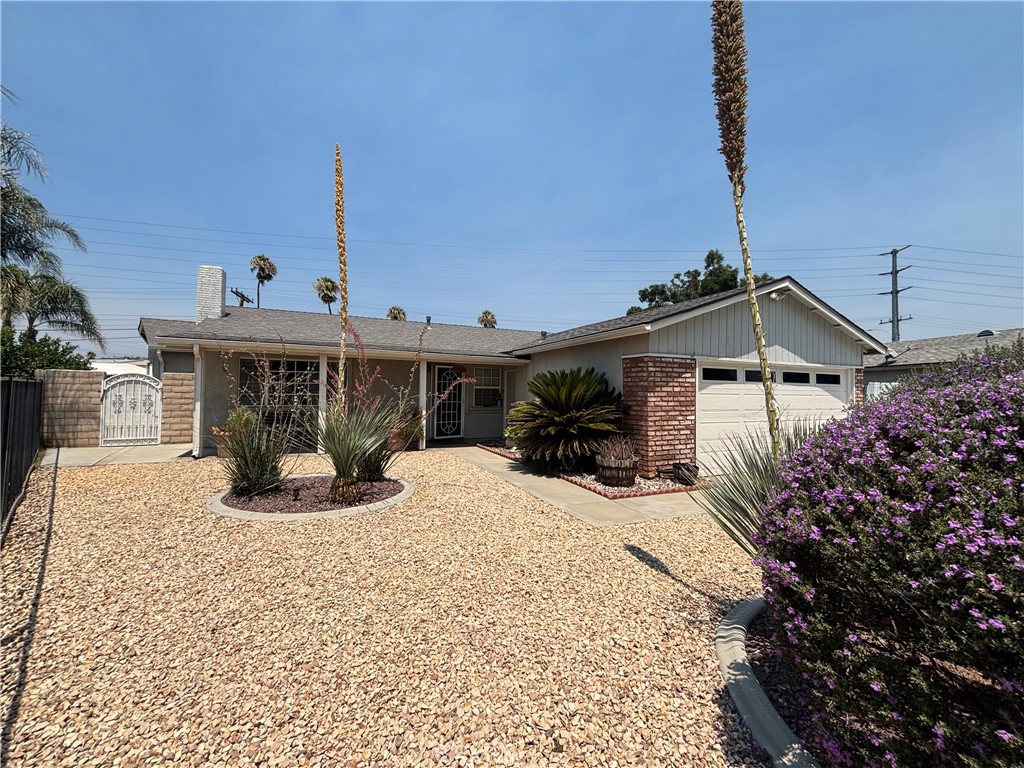 BEAUTIFUL HOME, GREAT PRIDE OF OWNERSHIP, VERY WELL TAKEN CARE OF. LOCATED NEAR SCHOOLS AND MAJOR SHOPPING CENTER AND 91 FREEWAY. HAS 4 SPACIOUS BEDROOMS AND 2 FULL BATHS. BEAUTIFUL OPEN PLAN WITH KICHEN AND FAMILY ROOM. THE POOL AND JACUZZI IS SPECTACULAR PERFECT FOR ENTERTAINING. ALSO HAS R/V ACCESS FOR YOUR BOAT OR R/V. THIS PROPERTY IS READY FOR MOVE IN.