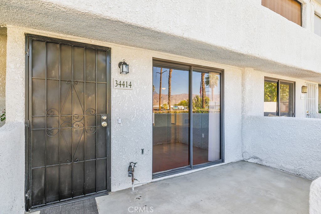 Located in the Rancho Mirage Resorts, this 3 bed and 2 bathroom townhouse is very spacious. Featuring laminate, and tile flooring. One bedroom and one bathroom are located downstairs. New kitchen counter tops. The stackable washer washer/dryer are located in the nice sized kitchen. Exiting the kitchen door you will enter into a nice brick patio space. 2 car private garage. This gated community also features swimming pools and tennis courts. Located close to shopping, restaurants, and schools.