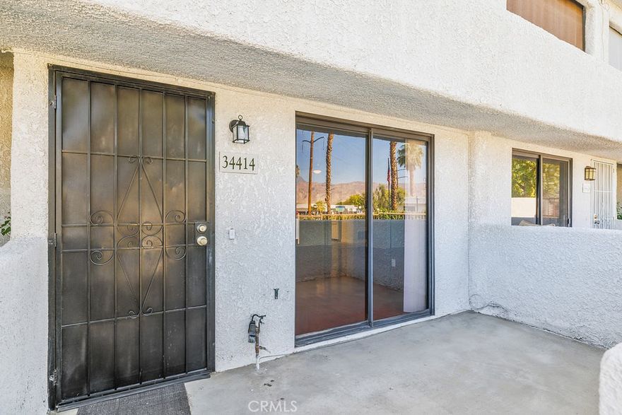 Located in the Rancho Mirage Resorts, this 3 bed and 2 bathroom townhouse is very spacious. Featuring laminate, and tile flooring. One bedroom and one bathroom are located downstairs. New kitchen counter tops. The stackable washer washer/dryer are located in the nice sized kitchen. Exiting the kitchen door you will enter into a nice brick patio space. 2 car private garage. This gated community also features swimming pools and tennis courts. Located close to shopping, restaurants, and schools.