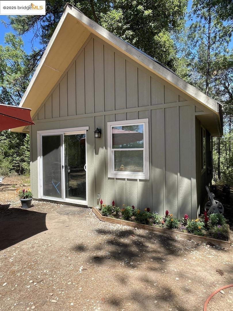 Discover a rare opportunity in the heart of Tahoe National Forest with this unique off grid property. Nestled at the end of a quiet road, just ¼ mile from pavement, it offers unmatched privacy and natural beauty while remaining near Bullards Bar Reservoir and Middle yuba river. At 2,000’ elevation—below the snow line—you’ll enjoy year-round access with long-range Mountain View’s. The property includes a permitted 3-bedroom septic, a permitted studio, a yurt, an old farmhouse, greenhouse, water storage, and well-established internal roads. A strong producing well and garden site provide the foundation for sustainable living. Whether you envision a private retreat, vacation getaway, or building your dream home, this land offers flexibility and potential. Only 25 minutes to Nevada City , shopping restaurants and just over an hour to Sugar Bowl ski resort, this is the perfect blend of seclusion, recreation, and convenience. Views: Ridge