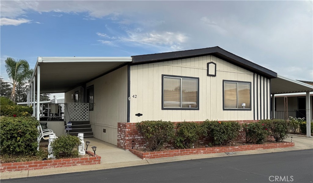 Highly, highly Motivated Sellers!! Welcome home to this spacious 3-bedroom, 2-bath, 1,248 sq. ft. manufactured home located in a quiet, well-maintained family park. The open floor plan offers a bright living room that flows into the dining area and kitchen, with two oversized bedrooms including a primary suite with a large closet and private bath. Additional features include a laundry room with storage and a covered carport with parking for 2–3 cars. The community provides resort-style amenities such as a swimming pool, hot tub, sauna, dog park, clubhouse, pickleball courts, shuffleboard, fire pit, and picnic area, all in a prime location for day trips to Oak Glen, Big Bear, Palm Springs, and Cabazon. Property will be sold AS-IS, and buyers with their agents are to conduct their own due diligence on all aspects of the property. Sellers will need three days after close of escrow to move out. Monthly space rent is $970 (water included).