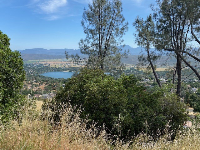 Gorgeous down sloped parcel in prestigious area of Hidden Valley Lake, with lovely homes all around, features sweeping panoramic lake and valley views. Soils analysis on file at 83' per bedroom.