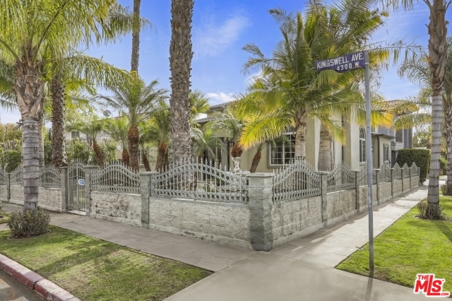 Lush foliage and Palm trees frame entrance path at the front area of house. Located right off of Los Feliz Village, this Traditional home is framed by a front yard of greenery and a large outdoor space. Supreme location, in the heart of immediate access to the bustle of eateries, retail, as well as practical shopping needs from Gelson's and Trader Joe's. An interior expansive layout, with 4 bedrooms and 3 baths. A prominent, grand living room, with pronounced heightened ceilings. This large space offers many configurations for a variety of family or single living needs. Common living/entertaining area is defined efficiently and is laid out as dedicated positioning, separate from the bedroom areas . The kitchen is well maintained with large storage areas. NELA environs, easy access to all recreation that Griffith Park has to offer, as well as providing the perfect blend of a charming neighborhood integrated into a thriving East Side city lifestyle.