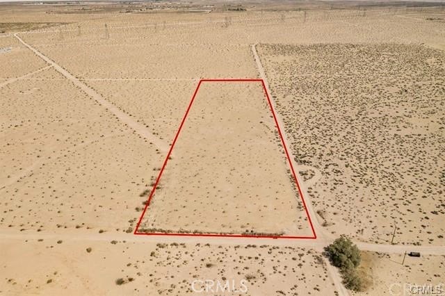 Nestled in the peaceful desert landscape of Newberry Springs, this expansive vacant lot offers breathtaking mountain views and endless possibilities. Whether you're looking to build your dream home, create a private retreat, or invest in land with versatile potential, this property provides the perfect canvas. Enjoy the tranquility of wide-open spaces while being conveniently located near Interstate 15 and Route 66 for easy access. With stunning sunrises and sunsets, this lot is ideal for those seeking privacy, off-grid living, or recreational use. Don’t miss this incredible opportunity to own a piece of California’s serene desert beauty.