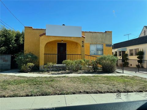 Photo of 418 E Arbor Vitae St, Inglewood, CA 90301 (MLS # DW26034440)