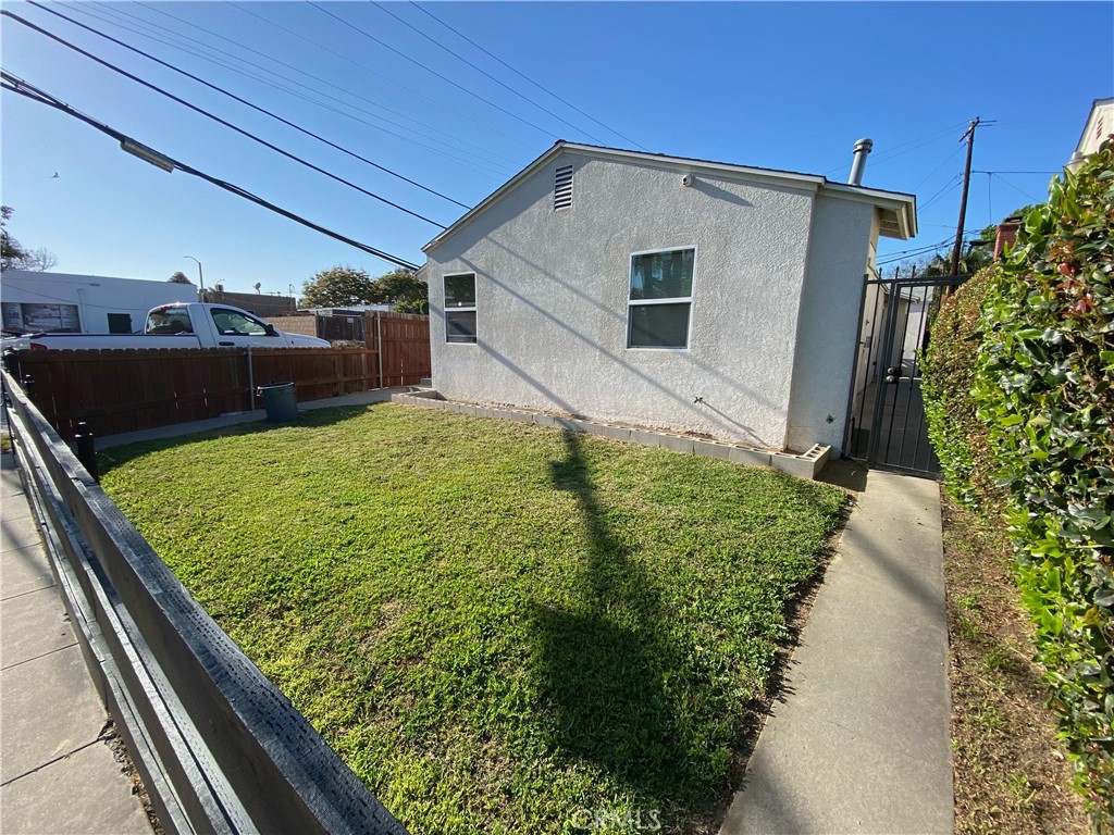 Opportunity Knocking on TWO Doors. Turnkey Duplex in Long Beach. Welcome to 121 Bort Street Long Beach. Each unit has 1 bedroom and 1 bath. Nicely done in and out a few years ago. Newer plumbing, roof, and windows. Along with a newer side driveway. Key is each unit has its own 2 car Garage! A total of 4 Secured Parking Spaces. Knock-Knock! Ask about the Lender of choice to get this deal done.