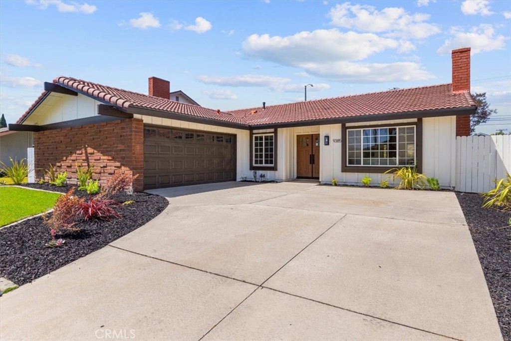 Welcome to this beautifully remodeled 4-bedroom, 2-bathroom home in the heart of Fountain Valley. With 1,800 sq ft of living space on a generous 6,400 sq ft lot, this move-in ready home blends modern design with everyday comfort. Step through the new solid wood double entry doors and into an open-concept layout featuring vaulted ceilings, recessed lighting, and new laminate flooring throughout. The living room showcases a custom tile fireplace and hearth with a custom wood mantle, creating a warm and inviting focal point. The gourmet kitchen is designed for both function and style with white oak cabinetry, a contrasting black oak island with built-in outlets, quartz countertops, new appliances (included), a new sink and faucet, canopy range hood, and new garbage disposal. The hall bath is bright and airy thanks to a skylight, while the primary bedroom offers a private retreat with wall-to-wall closets and a remodeled bathroom featuring a stand-up shower, quartz double vanity, LED mirrors, and a new exhaust fan. This home was designed by Izzy and Lilly from HGTV’s show Izzy Does It and completely remodeled by Battres Construction Design Build, celebrated for their work on numerous HGTV shows. Additional upgrades include; New windows in the primary bedroom, Central AC & heat, Fresh interior and exterior paint, and a full indoor laundry room with plenty of storage and folding space. Located in a peaceful, established neighborhood just minutes from major freeways, shopping, and restaurants, this home offers modern living in a prime location. Don’t miss this turnkey opportunity, schedule your private tour today!