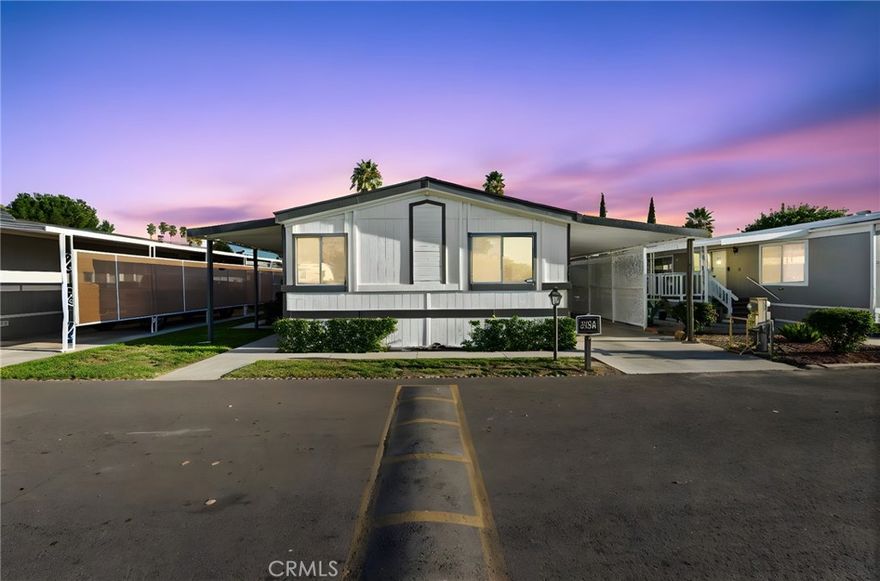 Beautiful home within the highly sought-after 55+ Country Lake Community of San Jacinto! Bursting with charm and a touch of nostalgia, this move-in-ready home has been refreshed with brand-new exterior paint, interior touch-ups, and freshly shampooed carpet. The bright and open floor plan offers comfortable living spaces, a functional kitchen with plenty of cabinetry, and a spacious primary suite designed for rest and relaxation. Enjoy peaceful pond and park views from the front of the home, with lush walking paths just steps away. The covered patio is perfect for morning coffee or evening sunsets, and the low-maintenance yard allows you to lock up and travel with ease. Residents of Country Lake enjoy access to a clubhouse, pool, spa, scenic lake, walking trails, and even RV parking and storage—creating the perfect blend of convenience, comfort, and active adult living. Close to shopping, dining, and medical facilities, this home offers exceptional value for those seeking a relaxed, connected lifestyle in a beautiful serene community. Best value in the community!