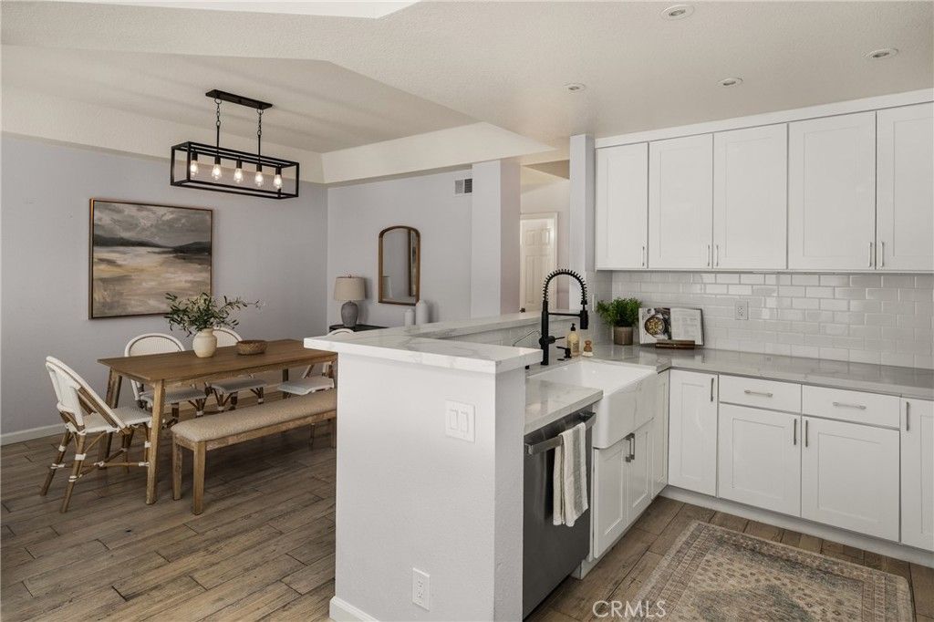 Photo of 19451 Pompano Ln #104, Huntington Beach, CA 92648 (MLS # PW25264860)