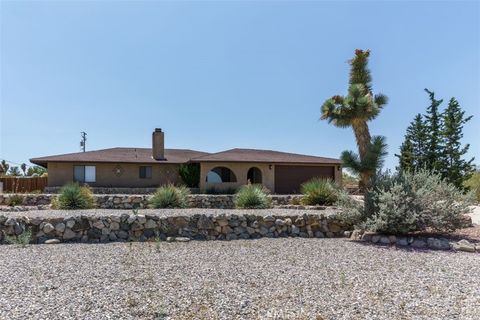 Photo of 58125 Bonanza DR, Yucca Valley, CA 92284 (MLS # JT26105643)
