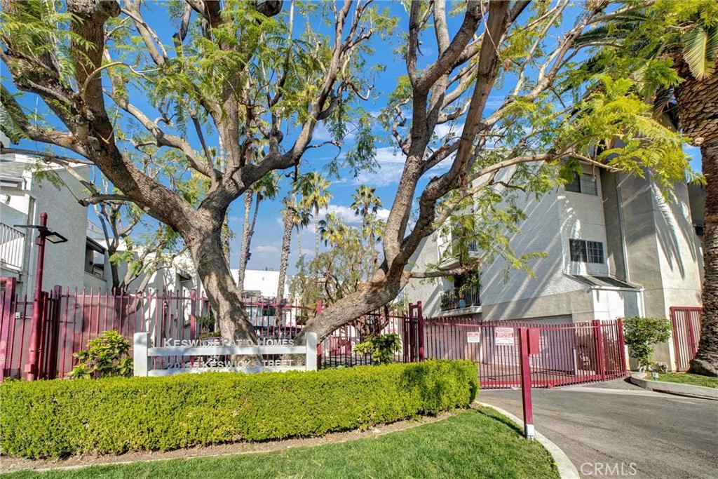 Welcome to this beautifully updated 2 bedroom 1 1/2 bathroom townhome offering stylish comfort. The home boasts an open-concept living and dining area, complemented by laminate flooring, a cozy fireplace, high ceilings, and a glass sliding door leading to the front patio. The renovated modern kitchen is equipped with stainless steel appliances, quartz countertops, and custom cabinetry. Upstairs, you'll find two spacious bedrooms with ample closet space, the main bedroom has a walk in closet, both bedrooms open to a large balcony offering views of the mountains. In unit laundry closet. Detached two car garage. The community is gated and includes a sparkling pool and spa, recreation room, lush landscaping, and guest parking. The home is centrally located in the heart of the San Fernando Valley, close to shopping, restaurants, transportation, and schools.