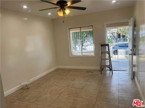 Photo of 1402 E 57th Street, Los Angeles, CA 90011 (MLS # 25598981)