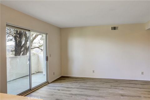 Photo of 21309 Eucalyptus Way #203, Newhall, CA 91321 (MLS # SR26054898)