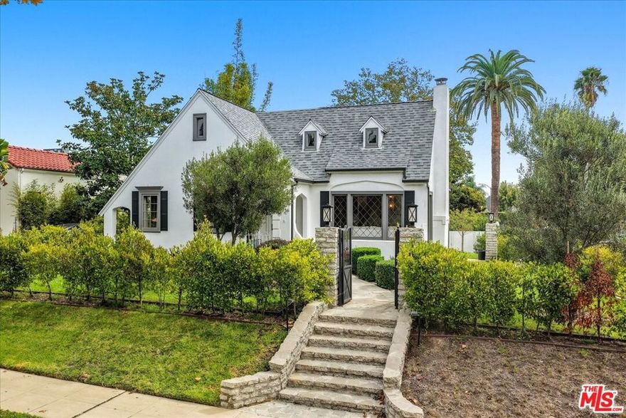 This thoughtfully reimagined Traditional home perfectly balances classic charm with sophisticated modern design.  The main house has 3 beds + 2.5 baths downstairs and upstairs, a serene primary suite with a spa inspired bathroom and a flexible loft seating area.  The bright and elegant living room is a showpiece with beamed ceilings, leaded glass windows and a decorative fireplace that anchors the conversation area. An expansive, sun-filled dining room flows seamlessly into the chef's kitchen with an inviting breakfast bar, wine fridge and custom built in cabinetry.  Outside, a charming patio invites al-fresco dining beside the pool. The fully equipped guest house offers flexibility for an office, gym or guest accommodations. Ideally located in Mid-Wilshire. Offered furnished or unfurnished.
