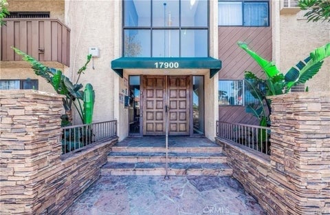 Photo of 17900 Sherman WAY #504, Reseda, CA 91335 (MLS # SR26224227)