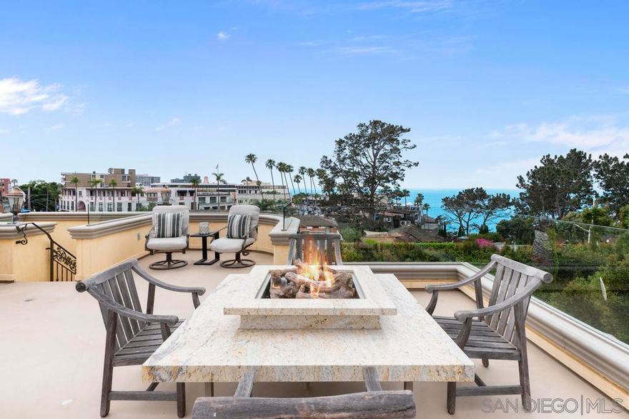 Elegant in style, solidly constructed as the builder's own home and renovated since, this gorgeous Mediterranean residence in the very heart of La Jolla's charming village offers a turn-key experience for easy primary or second home ownership. Finest custom handcrafted stone, woodwork, and iron detailing are found throughout with bright, voluminous curvilinear living areas. An elevator serves all interior levels. An entertainer's dream, the rooftop deck has magnificent 360° North Shore whitewater, coastline, Village and hillside views, dumb waiter, full kitchen and firepit for gathering family and friends. The guest bath is a jewel box, the kitchen a chef's dream, the wine cellar fit for a sommelier, and every living area and each bedroom a seductive place for rest and real relaxation. A must see.