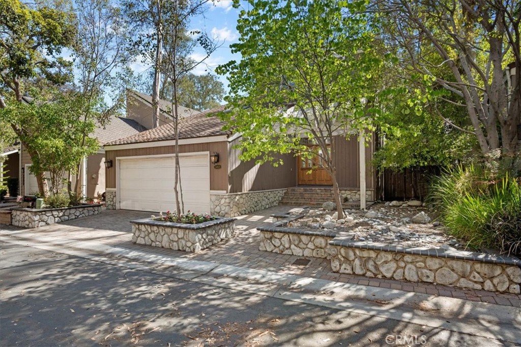 Welcome Home to 'Village Glen' in Lake Forest
Nestled among towering eucalyptus trees in this sought after community, this charming Lake Forest residence feels like a private retreat in the forest. Set on a serene single-loaded street, the setting offers peaceful surroundings with the convenience of nearby amenities and low HOA fees.
Step through the double-door entry and into a spacious foyer that flows into a light-filled living room with soaring cathedral ceilings and a cozy gas fireplace—the perfect centerpiece for gatherings. Dining choices include a formal Dining Room, and breakfast nook or dine al-fresco on the covered patio.
The home offers four spacious bedrooms, including one currently designed as a warm library/office, ideal for working from home or enjoying a good book complete with a skylight. The kitchen boasts more than an abundant amount of counter space, ready for weeknight meals or hosting a crowd, while two sets of glass doors invite you outdoors to the covered patio—a welcoming space to relax, entertain, or simply take in the tranquil views of the surrounding greenery. Doggy-dog also installed!
The primary suite is a true retreat with its cathedral ceilings, two sets of closets creating a sense of openness and calm. Thoughtful upgrades include PEX repiping and a freshly painted interior, giving you peace of mind and a move-in ready feel.
Village Glen offers a quiet, community-oriented lifestyle with access to parks, pools, pickleball, tennis and other recreational amenities—all while being tucked away in a neighborhood that truly feels like you’re living in nature.
Welcome to your forest escape in the heart of Lake Forest. Enjoy the VIDEO Tour.
