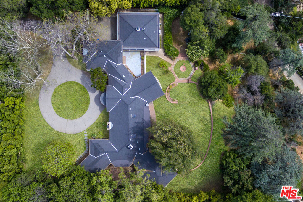 Let's engage! This Paul Williams classic on prestigious Oakmont Drive is having a new, awe-inspiring effect on estate agents and potential buyers alike. They recognize this rare opportunity and incredible value! The options are infinite. An opportunity has risen, for this legendary property, that demands attention. Marmol Radziner has created renderings of a home and massing plan that has been approved by the Office of Historic Resources. With these renderings, one can easily envision a dream home on this vast 54,000 sq.ft. property. Fantasize a distinctively designed estate, for your own personal lifestyle, a majestic compound with every amenity and activity at your fingertips. Savor the opportunity of luxurious living and entertaining on every level. One's vision will come to life in this idyllic setting with 200 foot frontage on Oakmont Drive. Indulge in an unpretentious yet privileged lifestyle with the aristocratic air so prevalent on the street.
