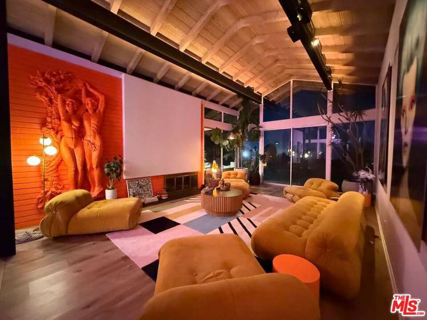 Gorgeous Mid-Century home nestled in the hills off Mullholland Dr. in the prestigious Bel Air Skycrest community within the award winning school district. This 5 bedroom, 4 bath home with a maid's quarters that inludes a separate entry and adjacent bath, home has walls of glass throghout to enjoy the wonderful panoramic view ofthe hills.  It is  an artistic delight with its dramatic layout and interior, truly a work of art, beautiful throughout.   It features a den with a wet bar and lots of cabinet space where the den can be used as an office or family room with a great fireplace in a room that has an entry to the backyard. The living room is spacious an open with a luxurious fireplace layout and, again, walls of glass throughout.   During the day you will enjoy the natural bright light throughout the home and in the evening. this gorgous home with its skylights, atrium and a very spacious backyard for entertainment or if you have chiden, it povides for lots of enjoyment of a playgrond and for the adults just a zen life feeling that will please your soul.  There is an on-site security guard to help you feel safe in this great community.  So much to offer, just come and see for yourself!