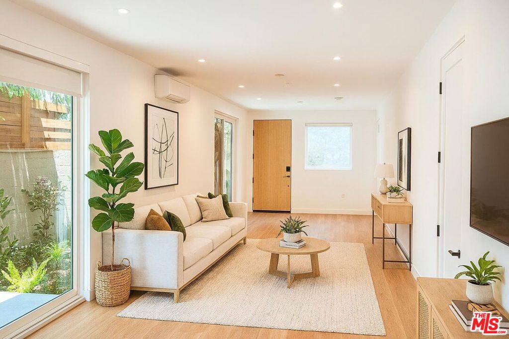 2 bedroom ground floor level unit BRAND NEW! Come tour this gorgeous new apartment located in the heart of North Hollywood! Ultra luxurious with tons of privacy and natural light! Unit features include private entry door, modern kitchen, stainless steel appliances, balcony off of living room, walk-in closets, bathrooms with luxury finishes, in-unit washer dryer, central AC/heat. Enjoy all the best that the east side has to offer! This unit is located in a prime North Hollywood location! You will get all the perks of the city while also enjoying tree lined streets in a more residential part of North Hollywood. Don't miss this opportunity to LOVE where you live! Street parking only (NO PARKING GARAGE).