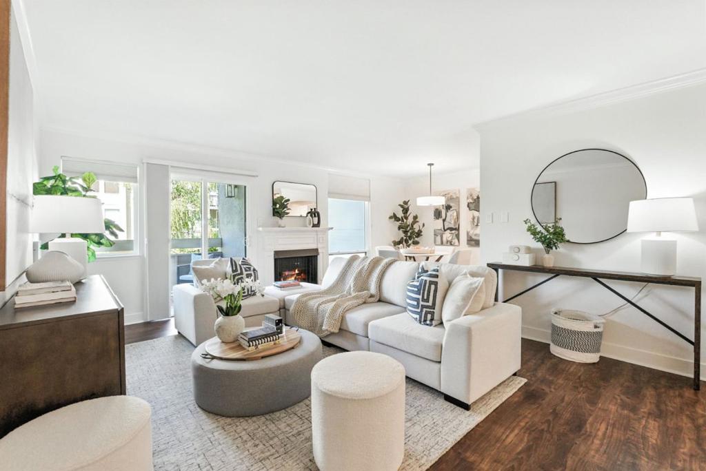Resort Style Living in this beautifully appointed updated and spacious unit in the popular Marina Point Complex! You will love the gourmet kitchen that features granite counters, stainless steel appliances & ample cabinet space. The open-concept living and dining area is anchored by an elegant fireplace and flows seamlessly to a private patio to enjoy the lush landscaped grounds. The expansive primary suite includes a walk-in closet, a dedicated space for a home office or reading nook and a tastefully remodeled en-suite bathroom. Generous sized second bedroom, the main bath features a shower/tub combo. In-unit Laundry room. Additional features are crown molding, updated lighting & fixtures, and fresh interior paint throughout. Amenities of the complex include resort style swimming pool area with a jacuzzi, picnic area, tennis courts, manicured grounds and scenic pathways. Enjoy the community of Foster City with waterfront trails, nearby parks, a dog park, top-rated schools and a variety of shopping and dining options just moments away.