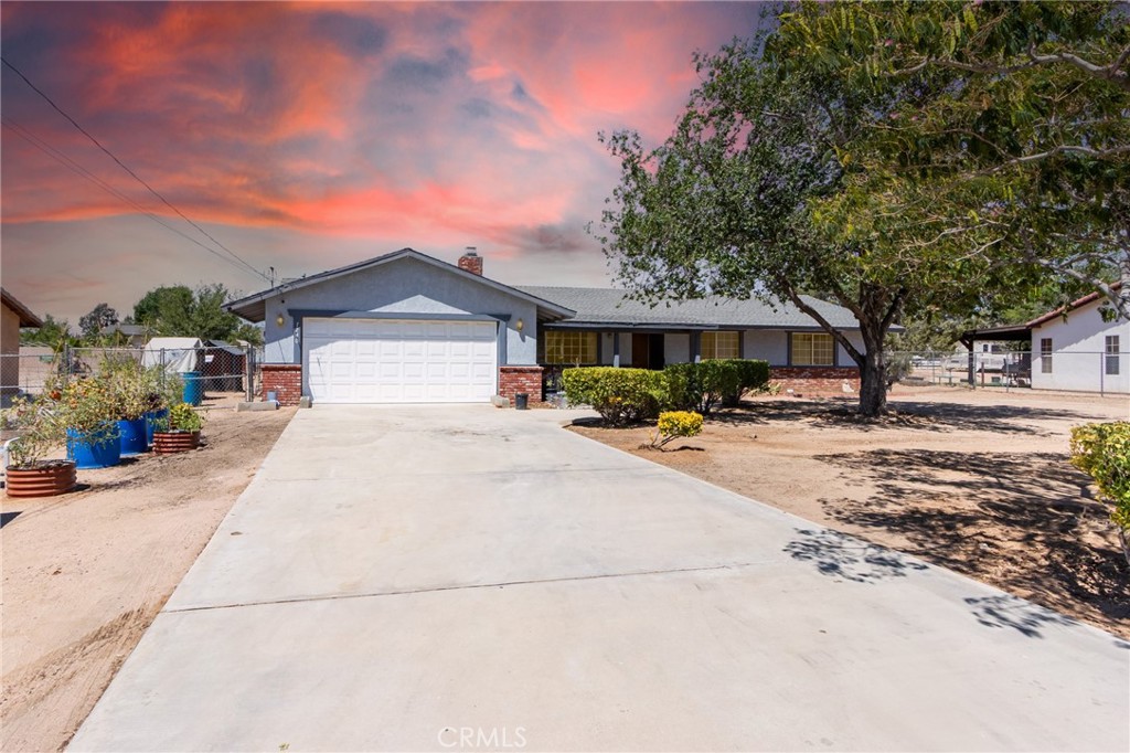 ***Hesperia single-story home offering space, comfort, and value**Featuring 3 bedrooms, 2 bathrooms, and 1,729 sq. ft. of living space, this property sits on nearly half an acre, giving you room to expand, entertain, or simply enjoy the open space***
Step inside to a bright living area with a cozy fireplace, an open dining space, and a flexible family room—perfect for a home office, playroom, or media space***The spacious kitchen provides plenty of cabinet storage and a functional layout ready for your personal touch**
Outside, the property shines with an extra-wide driveway, attached garage, and a large backyard ideal for gatherings, gardening, or future projects***Located in a quiet neighborhood with easy access to schools, shopping, and commuter routes, this home combines convenience with lifestyle potential***RV Access/Parking/Solar