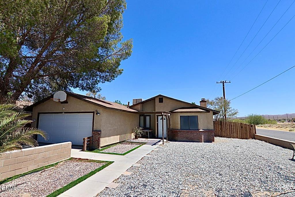 Charming Ridgecrest Home with Stunning Mountain Views Don't miss this adorable and well-maintained 3-bedroom, 2-bath home with 1,197 SF of living space nestled in the heart of Ridgecrest.This home features two spacious and separate living areas, perfect for relaxing or entertaining. Highlights include a warm fireplace, beautiful wood-look vinyl flooring, and a modern kitchen equipped with stainless steel appliances. Whether you're looking for comfort, style, or scenic beauty this home has it all. Schedule your showing today and come see this beautiful Ridgecrest gem!