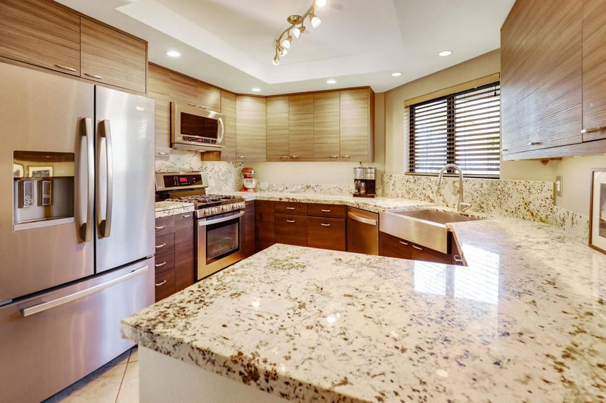 Welcome to The Palms! A centrally located Palm Springs gem! 3155 E Ramon Road #802 delivers refined desert living in a light-filled upper residence with approximately 1,339 square feet, 3 bedrooms, and 2 bathrooms. Elevated ceilings with dramatic vaults and clerestory windows frame serene mountain and garden outlooks, while an upgraded kitchen and a beautifully remodeled primary bathroom elevate daily comfort. The primary suite offers two closets, and the home's peaceful corner placement enhances privacy within a well-maintained, landscaped community. Resort-style amenities await: two pool-and-spa enclaves with cool-deck lounging areas and grills, tennis and pickleball courts, and gated entries with smartphone access that open to paver-finished drives. Enjoy a dedicated covered parking space, visitor parking, and an EV charging hook-up ready for your Level 2 equipment. A nearby pedestrian gate makes coming and going effortless. Lifestyle is the ultimate luxury here. Step out for direct access to the valley's multi-use trail for biking, running, and strolls, or wander one block to a 120-acre nature preserve--an inspiring daily backdrop. Shopping, everyday services, and dining are conveniently close, and the local airport terminal is walkable while the site remains away from typical flyover paths. Pet approval policies and nearby dog parks add ease, and furnishings are negotiable for a true turnkey option.