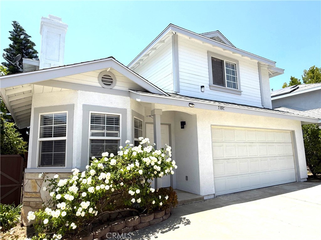 Welcome to this charming single-family home located in a desirable Planned Unit Development (PUD) in beautiful Monrovia. Recently refreshed by the HOA with newly washed and repainted exterior walls, this spacious residence features 4 bedrooms, 2.5 bathrooms, and a 2-car garage, all within an open and modern floor plan designed for comfortable living.
Step inside to a formal living room highlighted by a stunning brick fireplace and windows that flood the space with natural light. The cozy family room and open dining area create the perfect setting for gatherings and entertaining guests.
The upgraded kitchen is a chef’s delight, showcasing elegant white cabinetry, quartz countertops, and ample storage space—ideal for preparing delicious family meals.
Upstairs, the spacious master suite provides a peaceful retreat, featuring a freshly painted private bathroom with updated baseboards, a walk-in shower, soaking tub, and single vanity. Three additional well-sized bedrooms and a second full bathroom complete the upper level, offering plenty of space for family, guests, or a home office.
The low-maintenance backyard is beautifully landscaped with mature plants—perfect for relaxing or enjoying time outdoors.
Conveniently located near Old Town Monrovia, Arcadia, local markets, major shopping centers, and a wide array of restaurants. Walking distance to the middle school and the Metro Gold Line Station for easy commuting.
Don't miss this opportunity! Buyer to verify square footage.