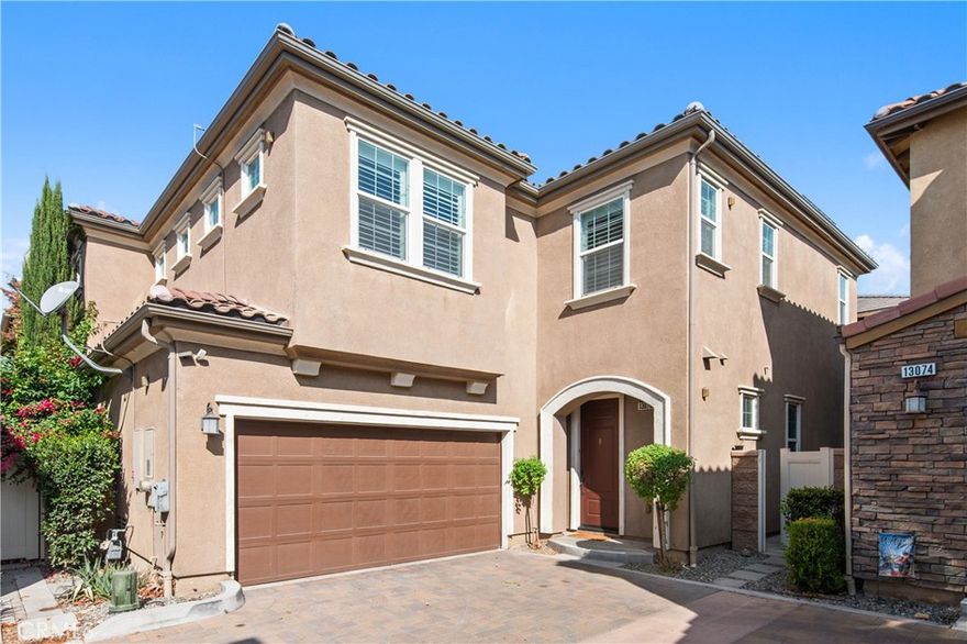 Turnkey home with SOLAR located in the heart of Eastvale offering 3,194 sq. ft. of living space with 5 bedrooms and 4.5 bathrooms including a convenient first-floor bedroom with full bath, ideal for guests or multi-generational living. The interior features beautiful tile flooring, crown molding, recessed lighting and surround sound, creating a bright and modern atmosphere. The open-concept kitchen flows seamlessly into the family room and highlights a large center island with bar seating, stainless steel appliances, walk-in pantry and abundant cabinet space. Upstairs includes a spacious loft, perfect for a media room, office or play area, while the primary suite offers dual vanities, soaking tub, walk-in shower and a customized walk-in closet. Shutters are installed throughout the second floor for added elegance. HOA amenities include swimming pool, spa, fitness center and more. Ideally located near award-winning schools, parks, and the newest shopping destinations including Costco, 99 Ranch Market, Walmart and the upcoming Whole Foods. Easy access to the 15, 60 and 71 freeways makes this home a commuter’s dream. Estimated tax rate is only 1.3%. Don’t miss this opportunity to own a stunning Eastvale property!
