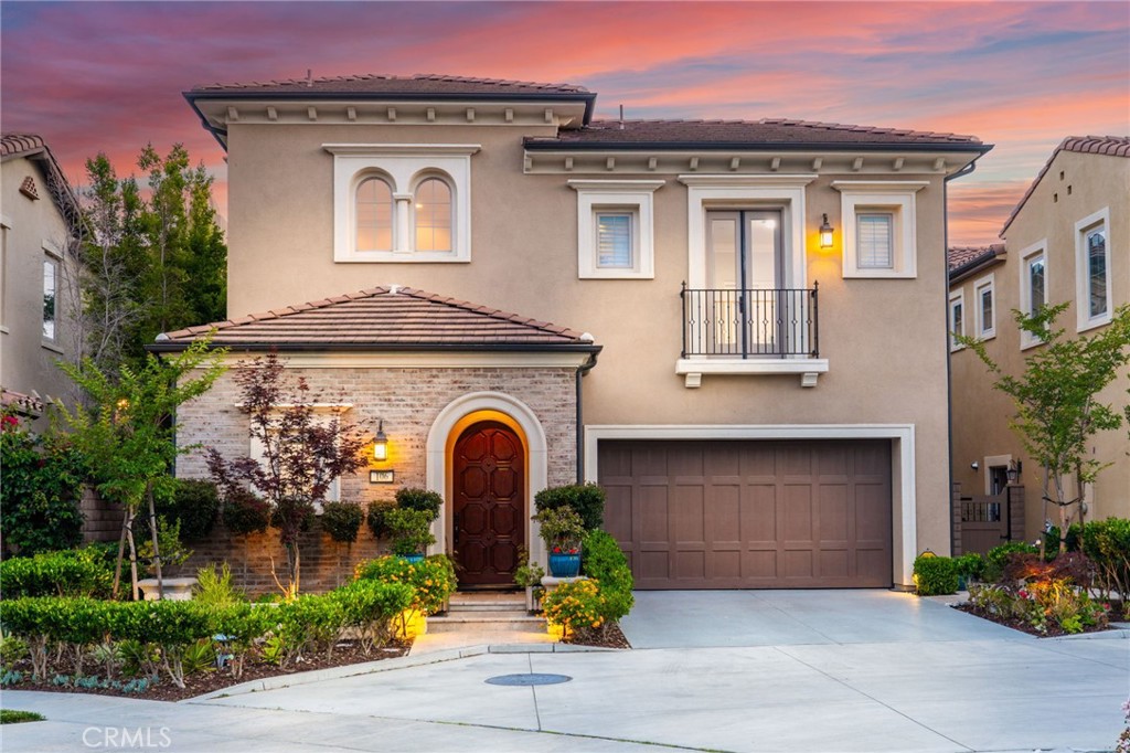 VIEW! VIEW! VIEW! Nestled in the exclusive gated community of The Groves at Orchard Hills, this stunning Capella Home boasts 4 bedroom, 4.5 bathroom, totaling 3,324 sqft of living space. Enjoy luxurious design & highly sought-after floorplan, with one bedroom on first level & 3 upstairs plus a loft. A gourmet master chef's kitchen featuring highly upgraded maple cabinets, stainless steel appliances, built-in refrigerator, wine cooler, a large high-end kitchen island with quartz counter top, and walk in pantry. Dining area opens to the spacious great room. Sliding glass door beautifully transitions this space to the California room and a low maintenance backyard where you either enjoy morning coffee or relax in the evening watching the amazing sunset or Disneyland firework. Updated wood flooring, window plantation shutters throughout. Huge master suite with spa-like bathroom & oversized balcony. Community amenities include: swimming pools and Jacuzzi, club house, BBQ, tennis courts and parks. Fabulous Orchard Hills Shopping Center and Award-winning Orchard Hills School are just minutes of a safe walk away. A Must See!