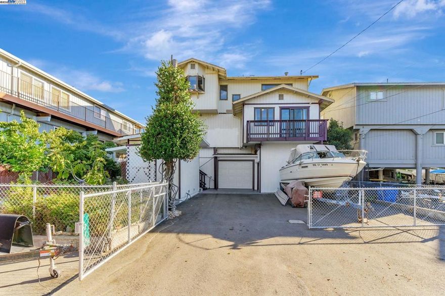 Experience serene living in this custom-built 4-bedroom, 2.5-bathroom waterfront home, boasting 1,732 sq ft of carefully crafted living space. Nestled near fast water, this residence offers seamless access to boating and outdoor adventures. Relish breathtaking views of Mt. Diablo, Jersey Island, and stunning sunsets that paint the sky. Perfect as a primary residence or a tranquil vacation retreat, this home combines affordability with waterfront charm, free from HOA fees. The newly added 40' private dock enhances the property’s appeal, offering exceptional value for water enthusiasts.