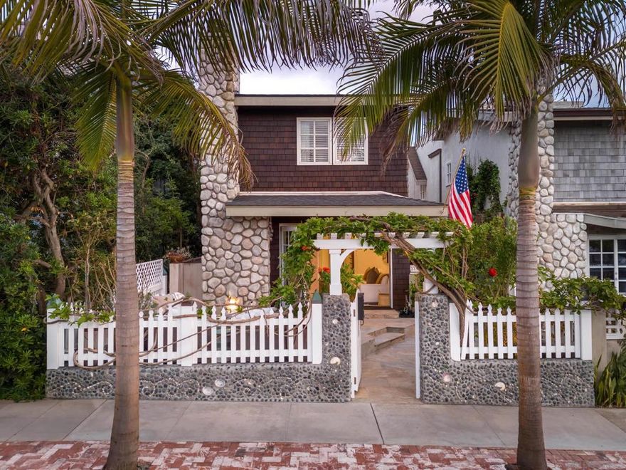 Nantucket-Style Beach Furnished Home | Ocean Views + Rooftop Deck Just a half-block from iconic Windansea Beach, this custom-built 3BR/3.5BA La Jolla home blends coastal charm and modern luxury. Enter through a vine-covered archway into a private front patio with seating and fire pit. Inside, the living room with stone fireplace and bi-fold doors opens to the patio for seamless indoor/outdoor living. The gourmet kitchen boasts Wolf appliances, Miele dishwasher, quartzite island, and adjacent dining area, plus a rear patio with built-in BBQ and heaters for al-fresco dining. Upstairs, the serene primary suite features sunset views, lounge area, and spa-like bath with steam shower and soaking tub. Two additional bedrooms and beautifully appointed baths complete the layout. The expansive rooftop deck showcases panoramic ocean views, fire pit seating, and space for entertaining. Other amenities include outdoor shower, laundry, two-car garage, and mini-split A/C. A rare opportunity to own a sophisticated coastal retreat steps from the surf and sand. Indulge in beautifully appointed bathrooms, one of which includes a steam shower and a soaking tub for a spa-like experience. The crowning gem is the expansive rooftop deck, where panoramic west-facing ocean views and multiple seating options await. Gather around the outdoor sectional couch and gas fire pit to witness colorful sunset vistas. Additional amenities include an outdoor shower for cleansing off the sand from your daily beach adventures, washer and dryer for convenience, garage parking for two vehicles, and mini-split A/C units for personalized comfort. Windansea Beach  offers a unique blend of coastal beauty and vibrant surf culture, making this seaside haven a truly memorable experience. This is a vacation rental and prices are subject to change and negotiable on long term rentals.