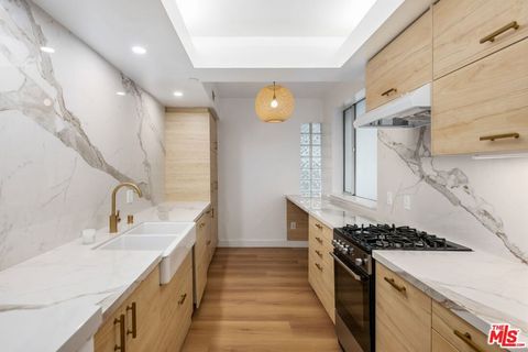 Photo of 171 N Church Lane #204, Los Angeles, CA 90049 (MLS # 26644765)