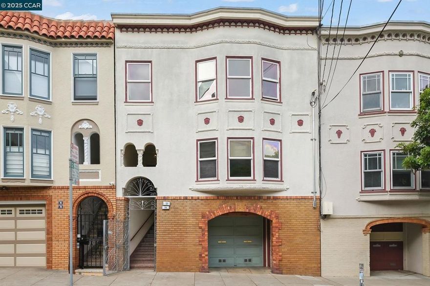 Welcome to 72-74 Cumberland Street, a rare offering in one of San Francisco‘s most vibrant neighborhoods.  On the market for the first time in 80 years, the timing is perfect for a “live-and-rent” owner occupant, investor or developer. A mere half block from your front door is the amazing 16 acre Dolores Park featuring a massive children’s playground, sport courts, dog play area and of course picnicking/sunbathing in its sunny & warm microclimate. This fabulous 1932 Mission Dolores Duplex is 3,110 square feet offering the perfect blend of classic charm, solid fundamentals and upside potential. The attached  2 car garage, basement bonus rooms, level backyard with garden all add to the wonderful appeal of this 3 story gem. Both 2 bedroom 1 bath units have abundant natural light, period details and iconic San Francisco views. Additional highlights include rich hardwood floors, arched doorways, spacious living room with fireplace, Bay Window with window seat, formal dining room, bright kitchen with breakfast room and built-in buffet plus so much more. Proximity to multiple thriving neighborhoods, transit, dining and walkable amenities make this property a true Standout!