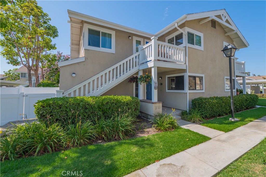 Well-maintained and charming first-floor condo, ideally located as a bright end unit. The inviting entry opens to a spacious living room with laminate flooring. The kitchen has been updated with stainless steel appliances and modern counters. Both the primary and guest bathrooms feature upgraded showers with tasteful finishes. A convenient in-unit laundry closet includes a washer and dryer. Enjoy the ease of first-floor living with a spacious private patio and extra storage room. Refrigerator, washer, and dryer are included.