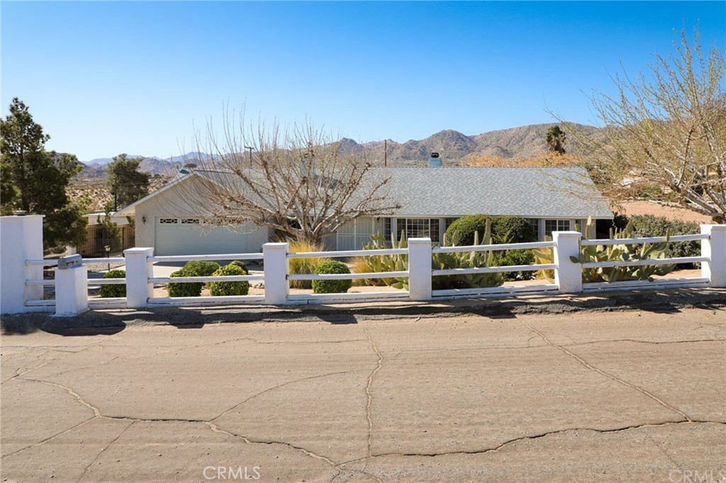 This turnkey home offers the perfect blend of desert charm and modern comfort. The thoughtful layout, recent mechanical upgrades, and scenic location make it both a tranquil retreat and a wise investment. With easy access to hiking trails and the National Park, it’s ideal for those yearning for desert serenity without sacrificing convenience. Property is a short sale still needing approval on final acceptance price.